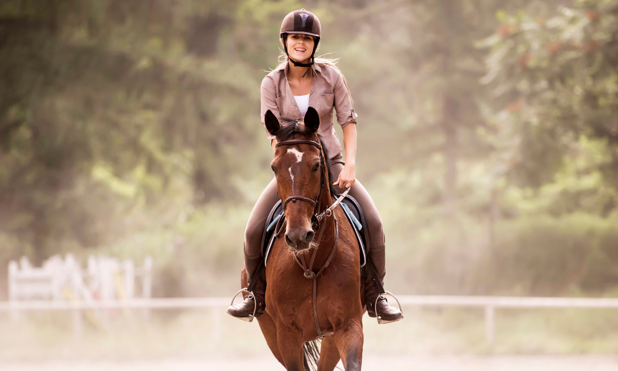 woman riding a horse 